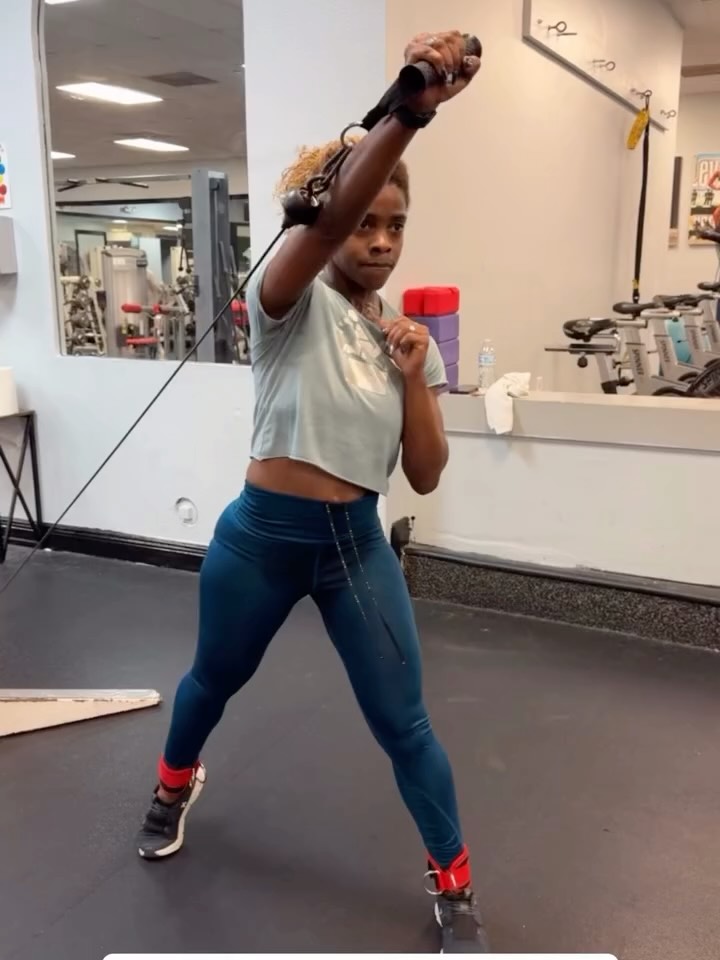 DMP Fitness client training a cable punch conditioning movement